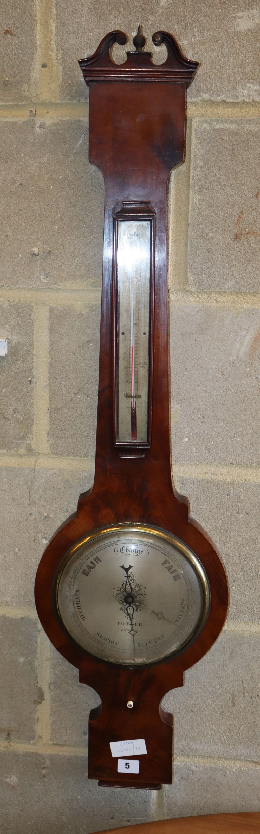 An early 19th century mahogany wheel barometer by Potter, London, H.102cm
